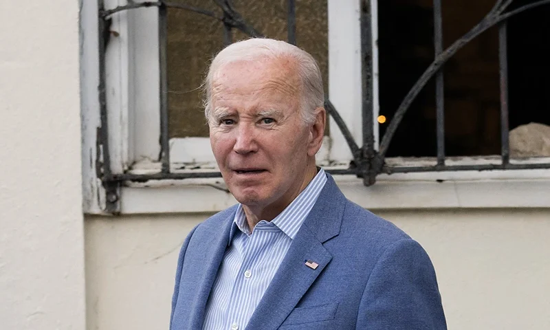 US President Joe Biden exits Holy Cross Catholic Church after attending mass in Christiansted, St. Croix, on the US Virgin Islands, on December 28, 2024 during a week-long vacation on the island. (Photo by SAUL LOEB / AFP) (Photo by SAUL LOEB/AFP via Getty Images)