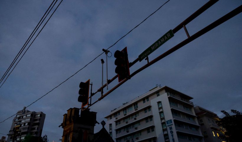 An intersection without stop lights is seen in the dark in San Juan, Puerto Rico after a major power outage hit the island on December 31, 2024. A major power outage plunged much of Puerto Rico into darkness Tuesday, with the US island territory's electric utility saying restoration could take up to two days. The "island-wide blackout" began at 5:30 am (0930 GMT), Luma Energy said in a social media statement. (Photo by Ricardo ARDUENGO / AFP) (Photo by RICARDO ARDUENGO/AFP via Getty Images)