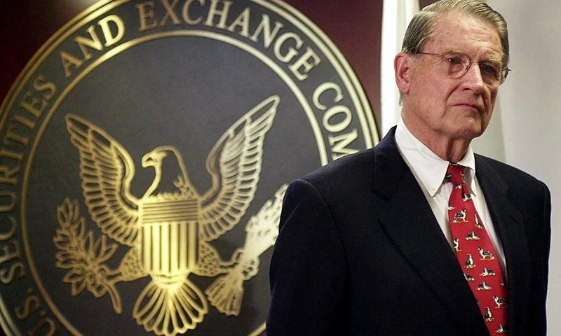 WASHINGTON, : William Webster listens to a question from the news media 25 October 2002 during a press conference after being voted chairman of a new Federal Securities and Exchange Commission Public Company Accounting Oversight Board at the SEC in Washington, DC. The SEC, in a divided vote, named Webster, former director of both the FBI and the Central Intelligence Agency, as chairman of a new Public Company Accounting Oversight Board. AFP PHOTO/Shawn THEW (Photo credit should read SHAWN THEW/AFP via Getty Images)