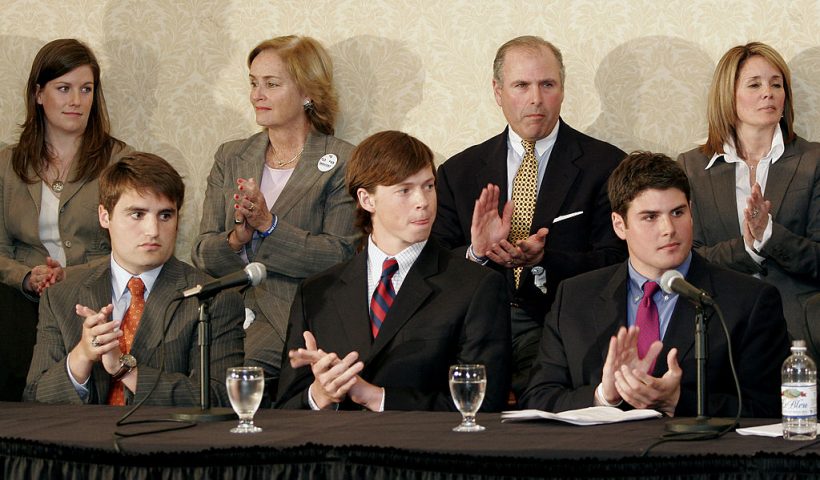 RALEIGH, NC - APRIL 11: Seated from left, Duke lacrosse players David Evans, Colin Finnerty and Reade Seligman listen during a news conference at the Sheraton Raleigh Hotel after being cleared of sexual assault charges April 11, 2007 in Raleigh, North Carolina. After a 12-week investigation of three players the North Carolina attorney general's office cleared them of all charges because of insufficient evidence. (Photo by Grant Halverson/Getty Images)
