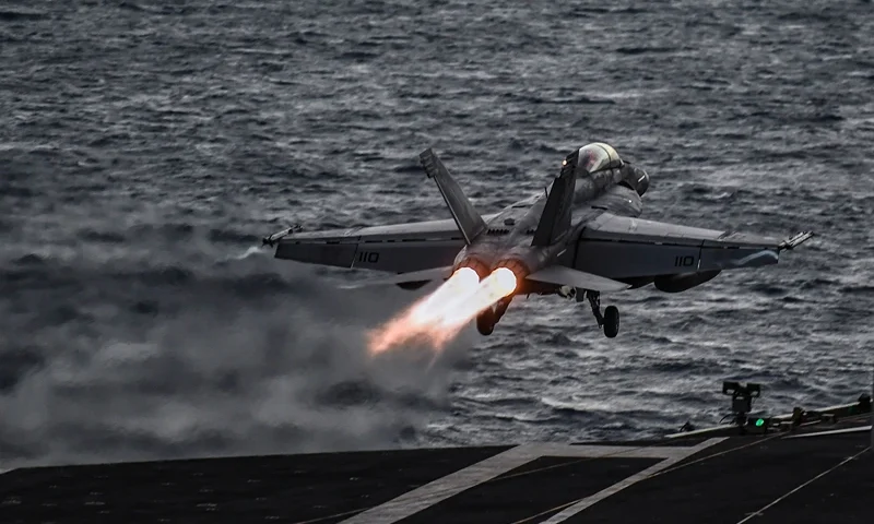 A F18 Hornet fighter jet pilot takes off from the deck of the US navy aircraft carrier USS Harry S. Truman in the eastern Mediterranean Sea on May 8, 2018. - The USS Harry S. Truman Carrier Strike Group on May 3 began air operations in support of Operation Inherent Resolve, conducting flight operations against the so called Islamic State (IS) targets in Syria and Iraq. The strike group includes a guided-missile cruiser and four guided-missile destroyers. (Photo by Aris MESSINIS / AFP) (Photo credit should read ARIS MESSINIS/AFP via Getty Images)