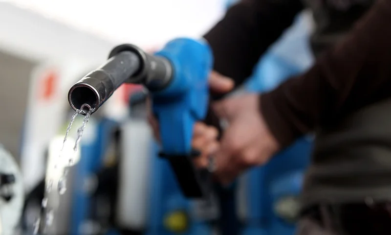 In this photo illustration a man refuels his car on March 23, 2010 in Munich, Germany. German President Horst Koehler said higher petrol prices could help make Germans become more environmentally conscious. (Photo Illustration by Miguel Villagran/Getty Images)