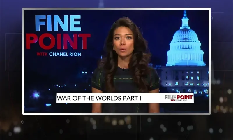Video still of the host of Fine Point at the desk of their talk show on One America News Network.