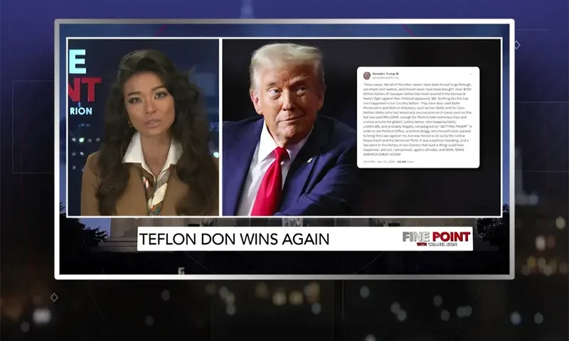 Video still of the host of Fine Point at the desk of their talk show on One America News Network.