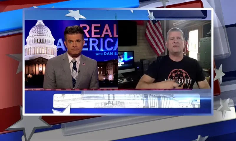 Video still from Real America on One America News Network showing a split screen of the host on the left side, and on the right side is the guest, Chris Burgard.