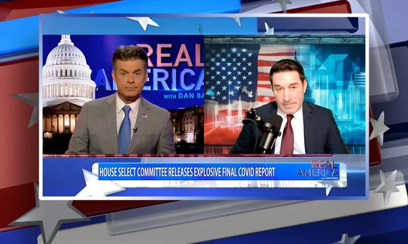 Video still from Real America on One America News Network showing a split screen of the host on the left side, and on the right side is the guest, Dr. Michael Schwartz.