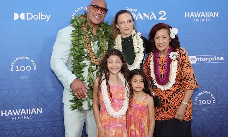 Actor Dwyane Johnson, Jasmine Johnson, Lauren Hashian, Tiana Johnson, and Ata Johnson arrive at the premiere of Disney Animation’s film Moana 2 in Kapolei, Hawaii, U.S. November 21, 2024. REUTERS/Marco Garcia/File Photo