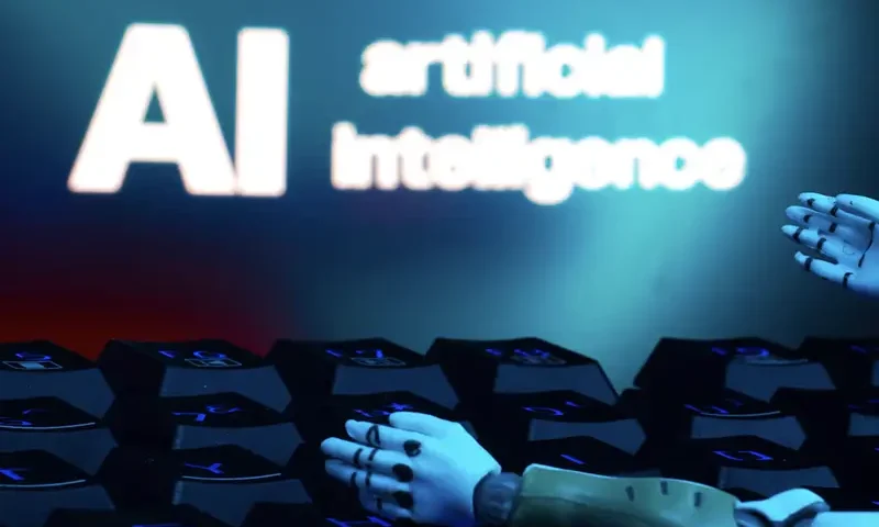 A message reading "AI artificial intelligence", a keyboard, and robot hands are seen in this illustration taken January 27, 2025. REUTERS/Dado Ruvic/Illustration/File Photo
