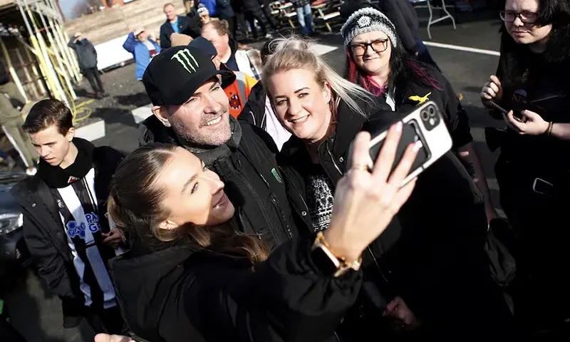 Boyzone member Shane Lynch poses for a selfie with fans before the match Action Images/Craig Brough/File Photo