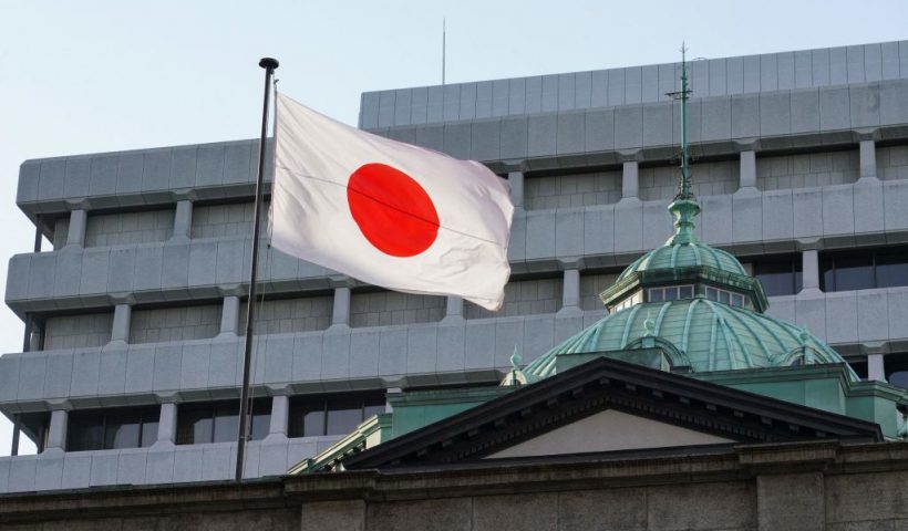 The Japanese national flag is seen at the Bank of Japan (BOJ) headquarters in Tokyo on April 28, 2023. (Photo by Kazuhiro NOGI / AFP) (Photo by KAZUHIRO NOGI/AFP via Getty Images)