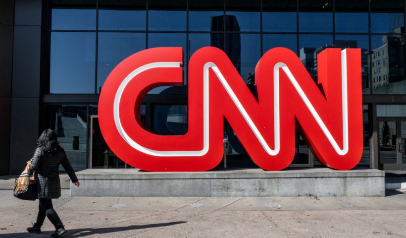 ATLANTA, GEORGIA - NOVEMBER 17: A person walks past the headquarters for the Cable News Network (CNN) on November 17, 2022 in Atlanta, Georgia. CNN's CEO and Chairman, Chris Licht, has confirmed that the company will begin layoffs in early December. (Photo by Brandon Bell/Getty Images)