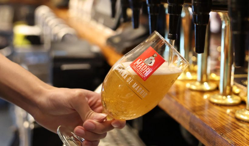 A bar worker pours a pint of lager at a pub in central London on November 22, 2023. Britain's Conservative government launched plans Wednesday to stimulate growth and woo voters for the next general election, delivering a massive tax-cut sweetener for workers but also forecasting sharply lower growth and stubbornly high inflation. In a further bid to ease the cost-of-living crisis, Hunt unveiled a series of changes to benefit payments, housing allowances and state pensions, while freezing alcohol duty. (Photo by Daniel LEAL / AFP) (Photo by DANIEL LEAL/AFP via Getty Images)