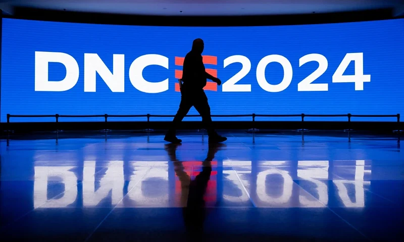 A worker walks through the concourse as preparations are made ahead of the Democratic National Convention (DNC) at the United Center in Chicago, Illinois, on August 17, 2024. Vice President Kamala Harris will formally accept the party's nomination for president at the DNC which runs from August 19-22 in Chicago. (Photo by SAUL LOEB / AFP) (Photo by SAUL LOEB/AFP via Getty Images)