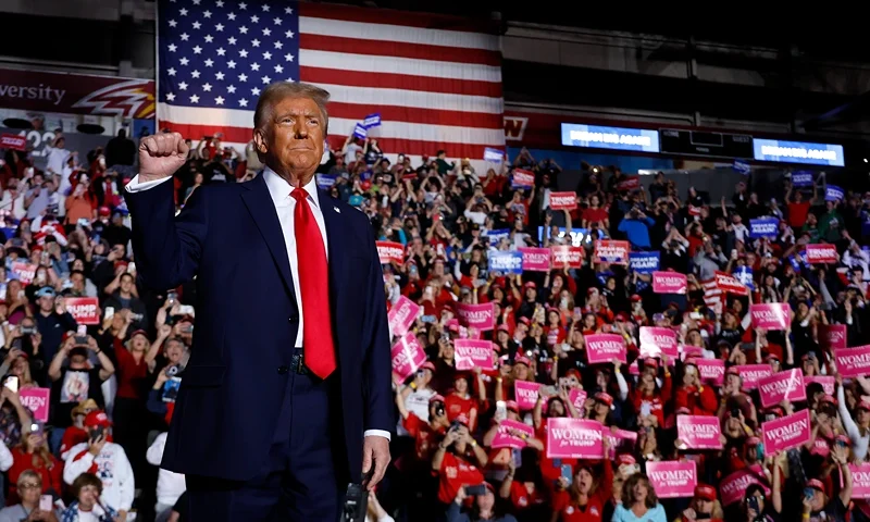 READING, PENNSYLVANIA - NOVEMBER 04: Republican presidential nominee, former President Donald Trump takes the stage during a campaign rally at the Santander Arena on November 04, 2024 in Reading, Pennsylvania. With one day left before the general election, Trump is campaigning for re-election in the battleground states of North Carolina, Pennsylvania and Michigan. (Photo by Chip Somodevilla/Getty Images)