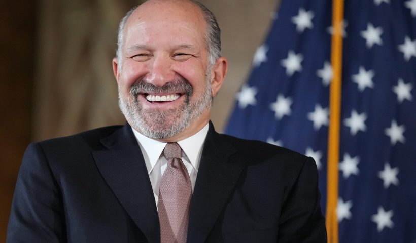 PALM BEACH, FLORIDA - DECEMBER 16: U.S. President-elect Donald Trump's nominee for Commerce Secretary, CEO of Cantor Fitzgerald Howard Lutnick, attends a statement by Trump and SoftBank CEO Masayoshi Son at Trump’s Mar-a-Lago resort on December 16, 2024 in Palm Beach, Florida. Trump announced that SoftBank will invest over $100 billion in projects in the United States including 100,000 artificial intelligence related jobs. (Photo by Andrew Harnik/Getty Images)