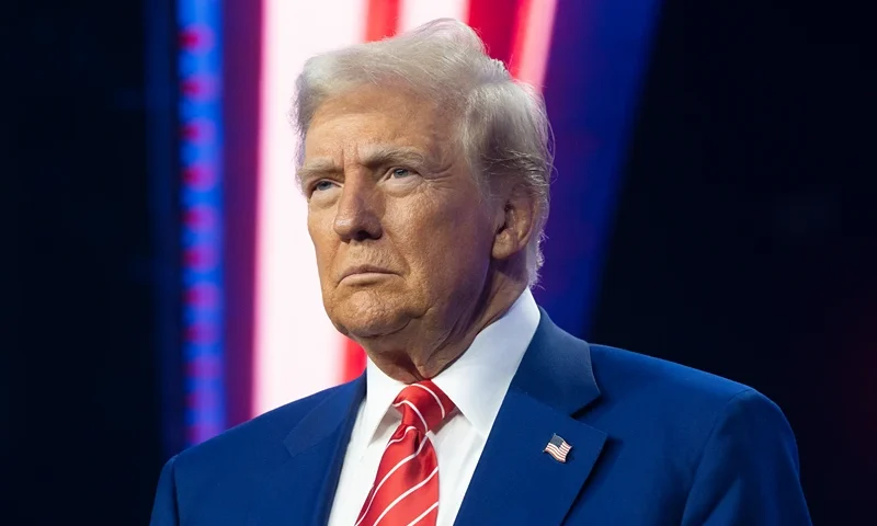 : U.S. President-elect Donald Trump looks on during Turning Point USA's AmericaFest at the Phoenix Convention Center on December 22, 2024 in Phoenix, Arizona. The annual four day conference geared toward energizing and connecting conservative youth hosts some of the country's leading conservative politicians and activists. (Photo by Rebecca Noble/Getty Images)