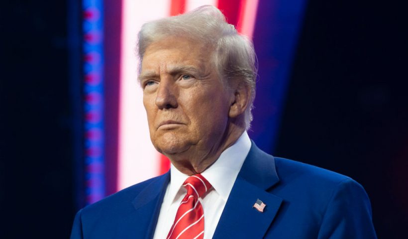 PHOENIX, ARIZONA - DECEMBER 22: U.S. President-elect Donald Trump looks on during Turning Point USA's AmericaFest at the Phoenix Convention Center on December 22, 2024 in Phoenix, Arizona. The annual four day conference geared toward energizing and connecting conservative youth hosts some of the country's leading conservative politicians and activists. (Photo by Rebecca Noble/Getty Images)