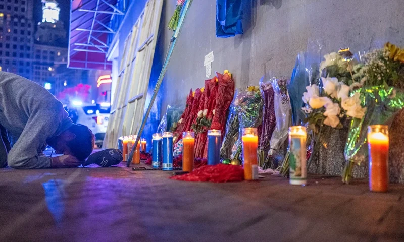 TOPSHOT - A man reacts as he prays at a memorial on Bourbon Street after it reopened to the public on January 2, 2025, in New Orleans, Louisiana, following an attack on January 1 which left 14 dead. A US army veteran loyal to the Islamic State jihadist group likely acted alone when he killed 14 and injured dozens in a truck attack on a crowd of New Year revelers in New Orleans, the FBI said on January 2. (Photo by ANDREW CABALLERO-REYNOLDS / AFP) (Photo by ANDREW CABALLERO-REYNOLDS/AFP via Getty Images)