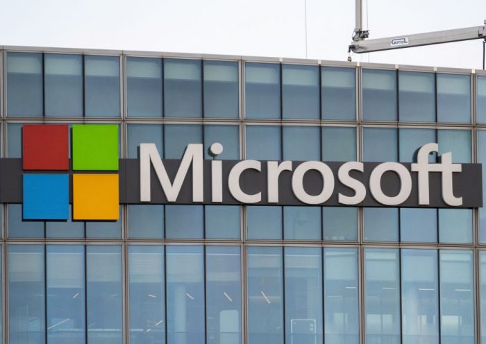 This photograph shows a view of Microsoft's logo on the company's French headquarters in Issy-les-Moulineaux on the outskirts of Paris on January 6, 2025. (Photo by Martin LELIEVRE / AFP) (Photo by MARTIN LELIEVRE/AFP via Getty Images)