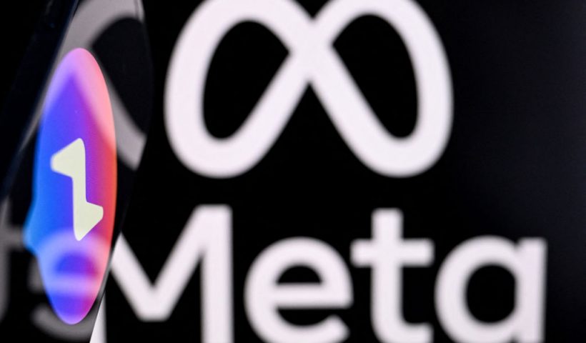 This photo illustration created on January 9, 2025, in Frankfurt am Main, western Germany, shows messenger of US online social media and social networking service Facebook logo displayed on a smartphone in front of the media giant Meta's logo on a laptop screen. Social media giant Meta on January 7, 2025 slashed its content moderation policies, including ending its US fact-checking program on Facebook and Instagram, in a major shift that conforms with the priorities of incoming president Donald Trump. The EU on January 8 rejected Meta chief Mark Zuckerberg's charge that the bloc engaged in "censorship" with its tech regulations. (Photo by Kirill KUDRYAVTSEV / AFP) (Photo by KIRILL KUDRYAVTSEV/AFP via Getty Images)