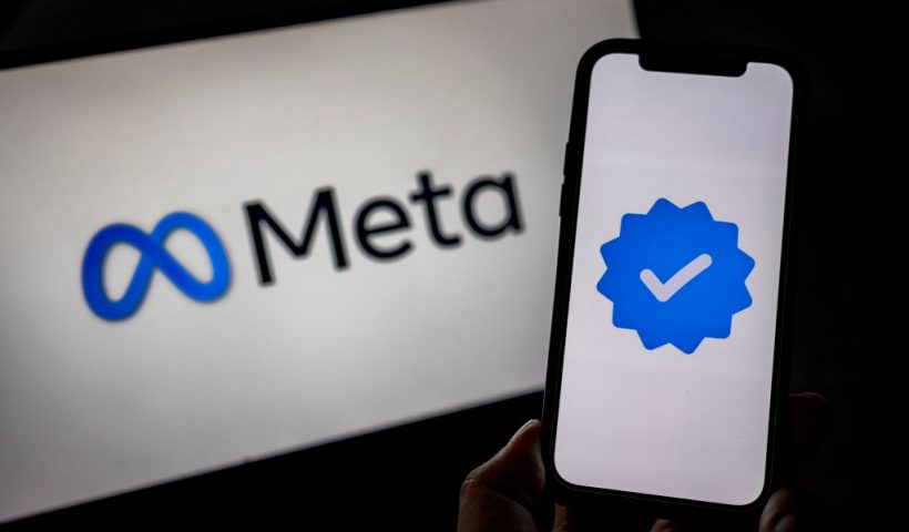 SANTA ROSA, PHILIPPINES - JANUARY 08: In this photo illustration, the Meta logo and its verified logo are seen on screens on January 08, 2025 in Santa Rosa, Philippines. Meta has announced the discontinuation of its fact-checking program, transitioning to a community-driven model that relies on users to add context to potentially misleading posts, a move aimed at promoting free expression. This significant policy shift has raised concerns among experts about the potential increase in misinformation and hate speech on Meta's platforms, including Facebook and Instagram, as the company prepares for a new political landscape under the upcoming Trump presidency. (Photo illustration by Ezra Acayan/Getty Images)