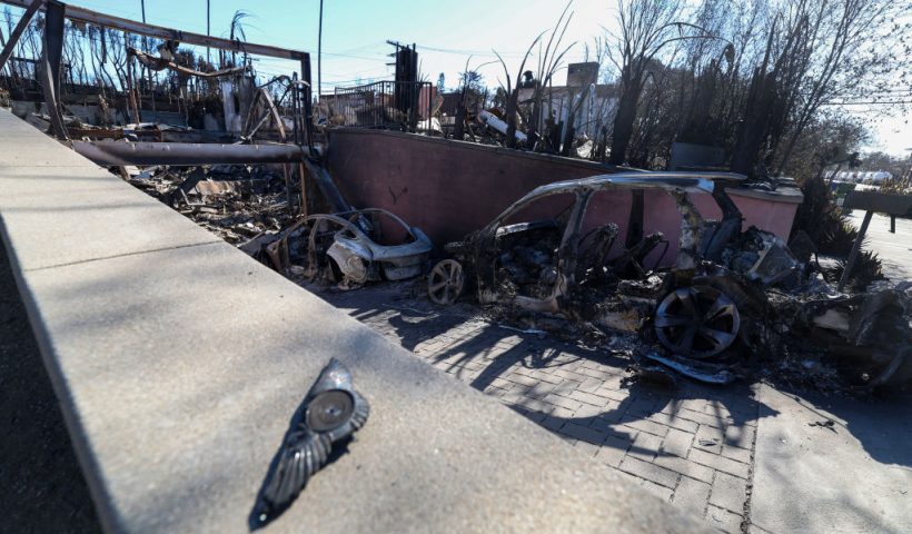 The entrance of Laeticia Hallyday's house is seen after being destroyed by the Palisades Fire, on January 14, 2025, in Pacific Palisades, California. Powerful winds forecast for late January 14 threatened to whip up massive fires that are still burning around Los Angeles in a tragedy that has killed at least 25 people and badly shaken the city. (Photo by VALERIE MACON / AFP) (Photo by VALERIE MACON/AFP via Getty Images)