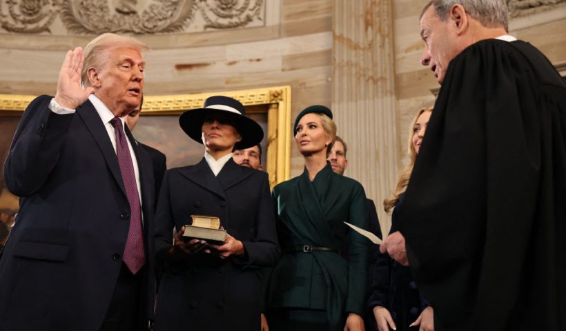 US President-elect Donald Trump takes the oath of office from US Supreme Court Chief Justice John Roberts during inauguration ceremonies in the Rotunda of the US Capitol on January 20, 2025 in Washington, DC. Donald Trump takes office for his second term as the 47th president of the United States. (Photo by Chip Somodevilla / POOL / AFP) (Photo by CHIP SOMODEVILLA/POOL/AFP via Getty Images)