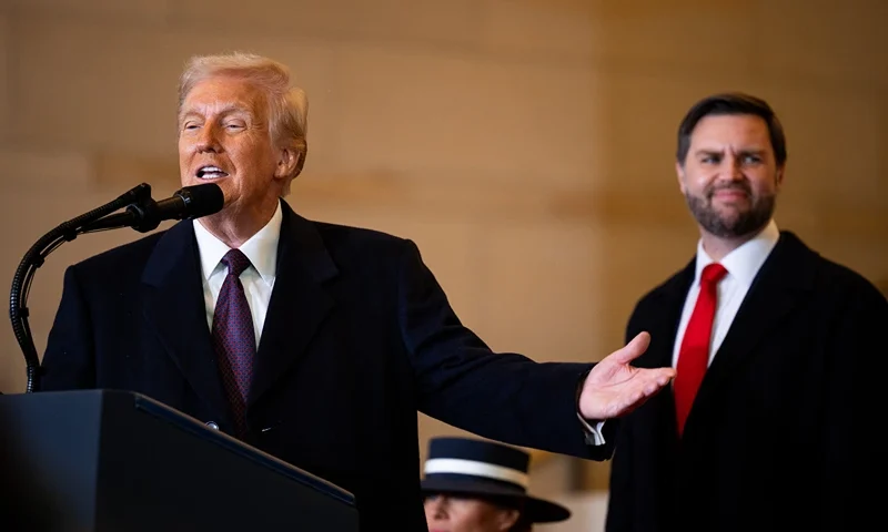 President Donald Trump speaks to the crowd as Vice President JD Vance looks on in the VIP overflow viewing area in Emancipation Hall after being sworn in as the 47th President of the United States in the US Capitol on January 20, 2025. (Photo by Bill Clark / POOL / AFP) (Photo by BILL CLARK/POOL/AFP via Getty Images)