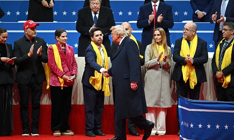 US President Donald Trump greets relatives of Israeli hostages taken by Hamas during the inaugural parade inside Capital One Arena, in Washington, DC, on January 20, 2025. (Photo by ANGELA WEISS / AFP) (Photo by ANGELA WEISS/AFP via Getty Images)