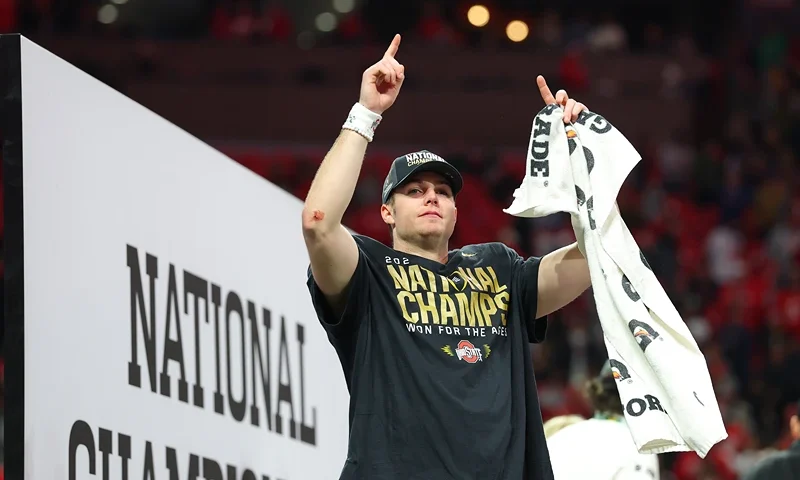 Will Howard #18 of the Ohio State Buckeyes celebrates after beating the Notre Dame Fighting Irish 34-23 in the 2025 CFP National Championship at the Mercedes-Benz Stadium on January 20, 2025 in Atlanta, Georgia. (Photo by Kevin C. Cox/Getty Images)