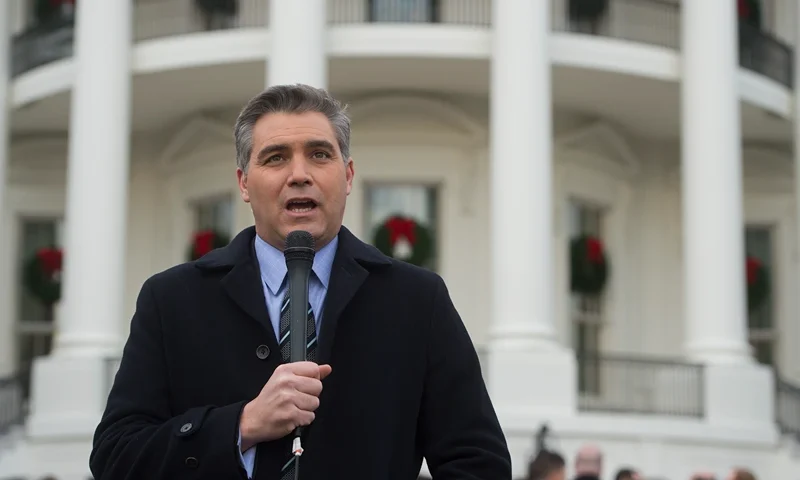 Jim Acosta, Senior White House Correspondent for CNN, speaks on camera after US President Donald Trump held an event about the passage of tax reform legislation on the South Lawn of the White House in Washington, DC, December 20, 2017. - Trump hailed a "historic" victory Wednesday as the US Congress passed a massive Republican tax cut plan, handing the president his first major legislative achievement since taking office nearly a year ago. (Photo by SAUL LOEB / AFP) (Photo by SAUL LOEB/AFP via Getty Images)
