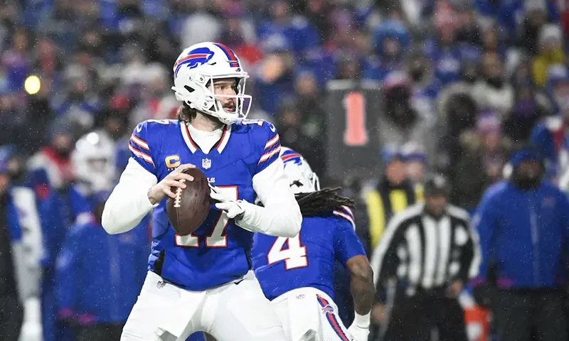 Buffalo Bills quarterback Josh Allen (17) drops back to pass during the first quarter against the Baltimore Ravens in a 2025 AFC divisional round game at Highmark Stadium. Mandatory Credit: Mark Konezny-Imagn Images