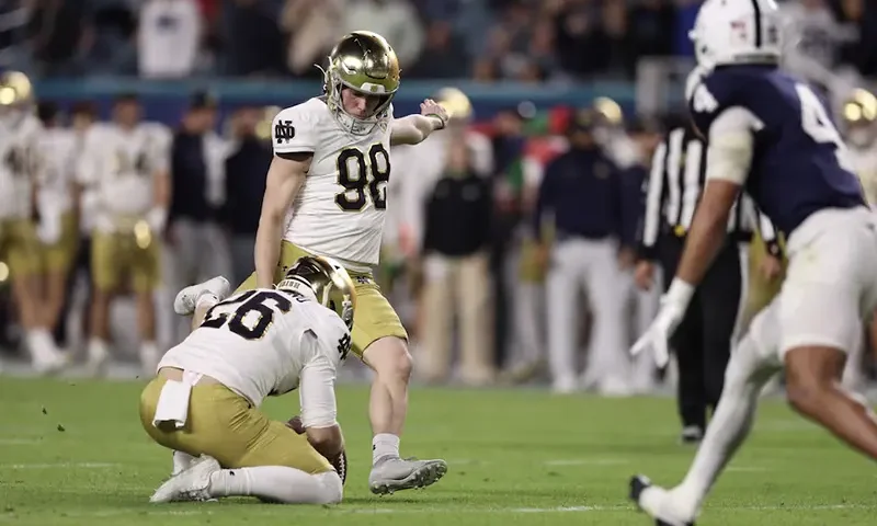 Notre Dame Fighting Irish place kicker Mitch Jeter (98) kicks the ball in the second half against the Penn State Nittany Lions in the Orange Bowl at Hard Rock Stadium. Mandatory Credit: Nathan Ray Seebeck-Imagn Images/ File Photo