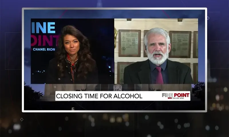 Video still from Fine Point on One America News Network showing a split screen of the host on the left side, and on the right side is the guest, Dr. Robert Malone.
