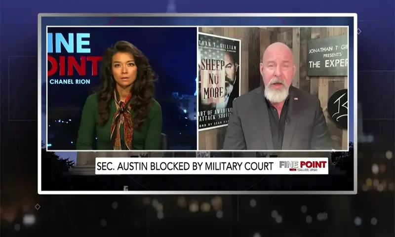 Video still from Fine Point on One America News Network showing a split screen of the host on the left side, and on the right side is the guest, Jonathan Gilliam.