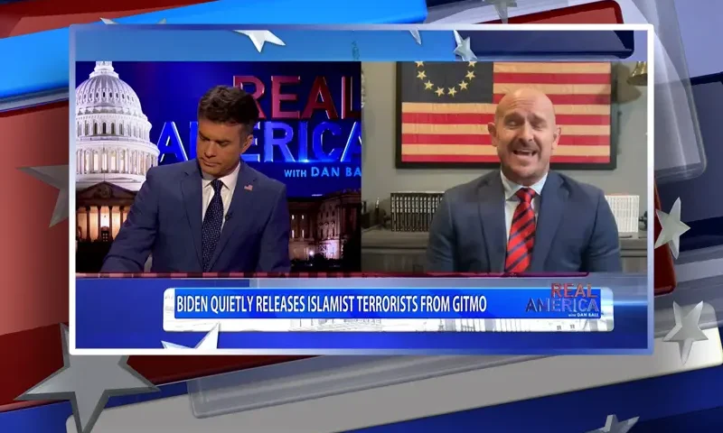 Video still from Real America on One America News Network showing a split screen of the host on the left side, and on the right side is the guest, Mike Sarraille.