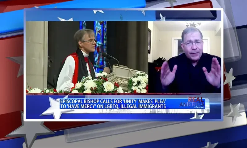 Video still from Real America on One America News Network during an interview with the guest, Frank Pavone.