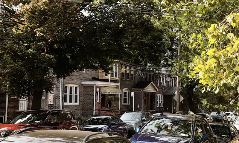 A row of residential houses stands in Queens' neighborhood of Ridgewood, New York, U.S., September 16, 2022. REUTERS/Amr AlfikyFile Photo