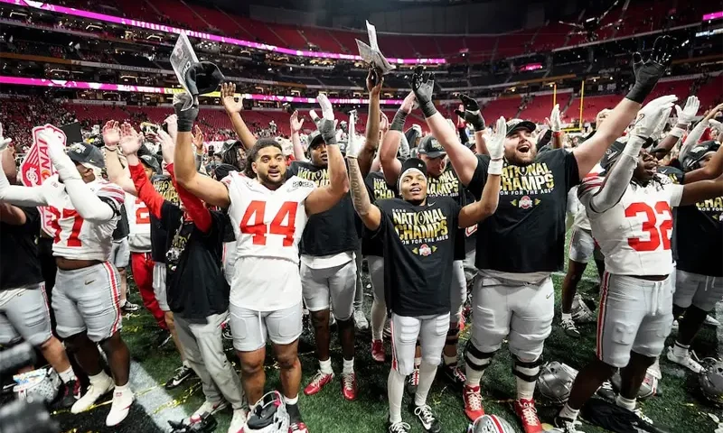 Ohio State Buckeyes players celebrate their 34-23 win over the Notre Dame Fighting Irish to win the College Football Playoff National Championship at Mercedes-Benz Stadium in Atlanta on January 20, 2025. Mandatory Credit: Adam Cairns/USA TODAY NETWORK via Imagn Images