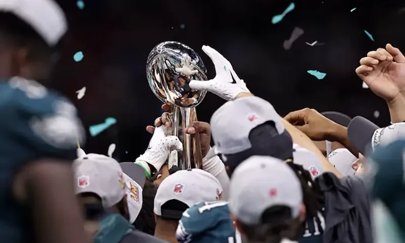 A detail view as the Philadelphia Eagles lift the Vince Lombardi Trophy after winning Super Bowl LIX against the Kansas City Chiefs at Caesars Superdome. Mandatory Credit: Bill Streicher-Imagn Images/File Photo