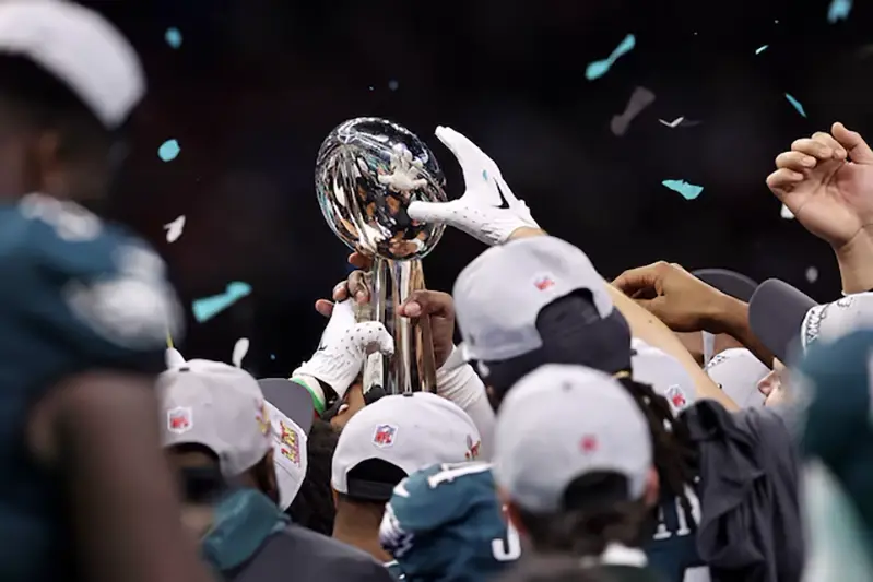 A detail view as the Philadelphia Eagles lift the Vince Lombardi Trophy after winning Super Bowl LIX against the Kansas City Chiefs at Caesars Superdome. Mandatory Credit: Bill Streicher-Imagn Images/File Photo