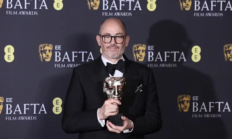 Director Edward Berger poses with the award for the Outstanding British Film Award for "Conclave", during the 2025 British Academy of Film and Television Awards (BAFTA) at the Royal Festival Hall in the Southbank Centre, London, Britain, February 16, 2025.