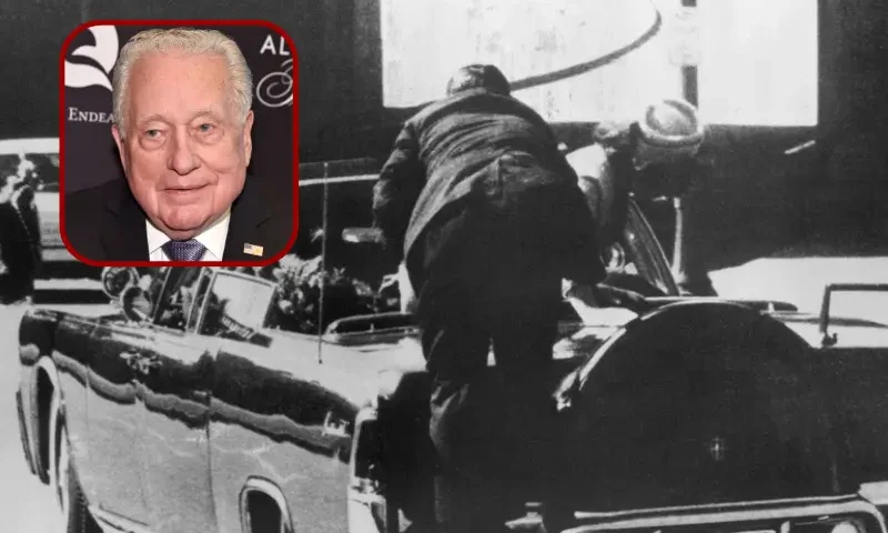 B| JFK's car as Hill Clint climbs in. A gunshot can be seen on the windscreen. (Photo by Pascal Le Segretain/Sygma via Getty Images) F| NEW YORK, NY - MAY 08: Clint Hill attends the Always At The Carlyle Premiere on May 8, 2018 in New York City. (Photo by Bryan Bedder/Getty Images for Always at the Carlyle)