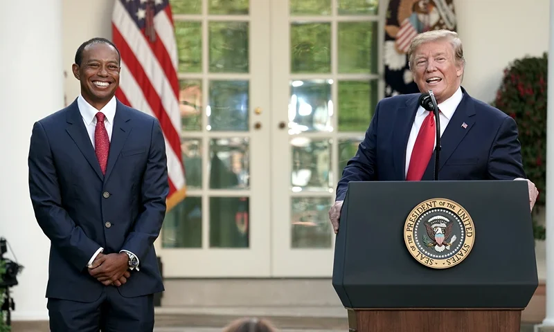 WASHINGTON, DC - MAY 06: U.S. President Donald Trump gives professional golfer and business partner Tiger Woods the Medal of Freedom during a ceremony in the Rose Garden at the White House May 06, 2019 in Washington, DC. Trump announced he would give the nation’s highest civilian honor to Woods, 43, in honor of his Masters victory last month. (Photo by Chip Somodevilla/Getty Images)