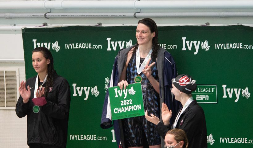 CAMBRIDGE, MA - FEBRUARY 18: University of Pennsylvania swimmer Lia Thomas smiles on the podium after winning the 200 yard freestyle during the 2022 Ivy League Women's Swimming and Diving Championships at Blodgett Pool on February 18, 2022 in Cambridge, Massachusetts. (Photo by Kathryn Riley/Getty Images)