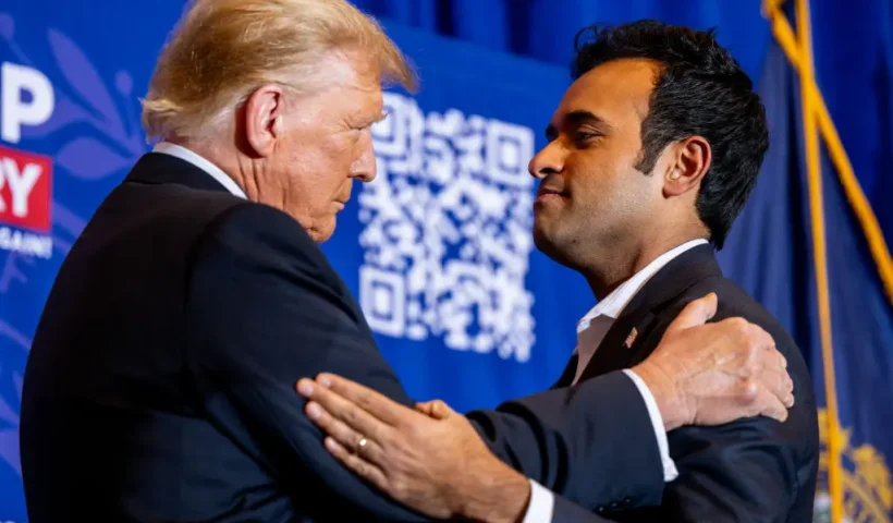 ATKINSON, NEW HAMPSHIRE - JANUARY 16: Republican presidential candidate, former U.S. President Donald Trump greets U.S. entrepreneur Vivek Ramaswamy while speaking during a campaign rally at the Atkinson Country Club on January 16, 2024 in Atkinson, New Hampshire. Ramaswamy withdrew from the race and publicly voiced his support for Trump on January 15, 2024. Trump won this week's Iowa caucus, solidifying him as the lead Republican nominee in the first balloting of 2024. The former U.S. President heads to Atkinson, New Hampshire today as he continues campaigning during the primary election. (Photo by Brandon Bell/Getty Images)