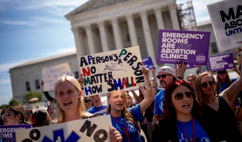 WASHINGTON, DC - JUNE 20: A group of pro-life supporters rally in front of the Supreme Court on June 20, 2024 in Washington, DC. The Supreme Court issued four rulings today including upholding a tax on foreign income, but has not yet announced rulings on a variety of high profile cases dealing with abortion rights, gun rights, and former President Donald Trump's immunity claim. (Photo by Andrew Harnik/Getty Images)