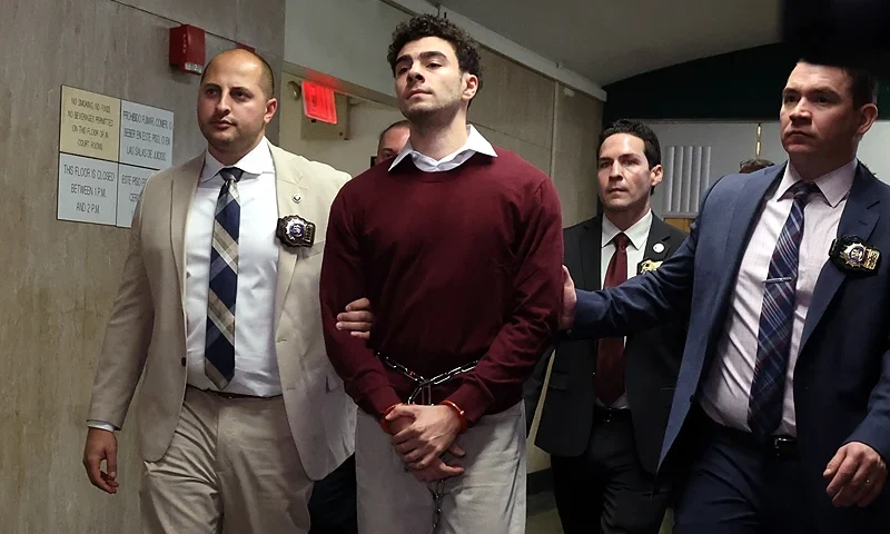 NEW YORK, NEW YORK - DECEMBER 23: Luigi Mangione departs Manhattan Criminal Court on December 23, 2024 in New York City. Mangione, 26, appeared for his arraignment on state murder charges in the killing of UnitedHealthcare CEO Brian Thompson on a Manhattan street on December 4. (Photo by Spencer Platt/Getty Images)