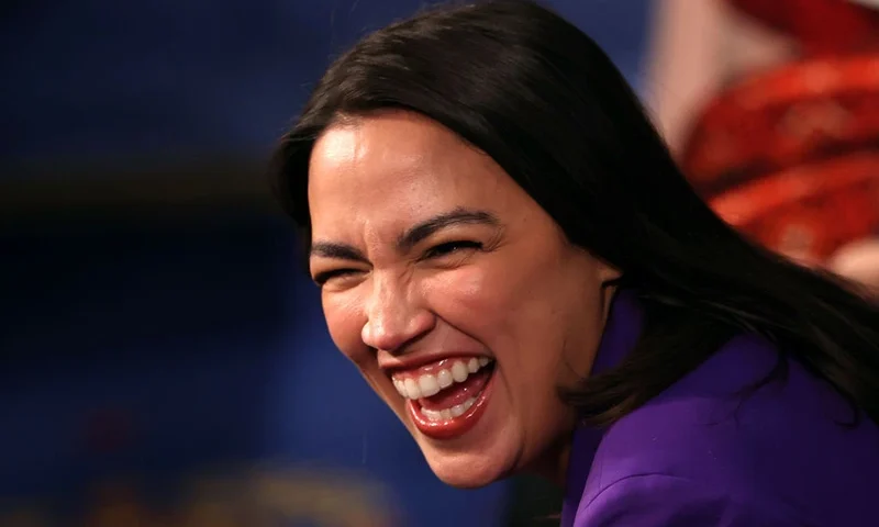 WASHINGTON, DC - JANUARY 03: U.S. Rep. Alexandria Ocasio-Cortez (D-NY) arrives for the first day of the 119th Congress in the House Chamber of the U.S. Capitol Building on January 03, 2025 in Washington, DC. Rep. Mike Johnson (R-LA) is working to retain the Speakership in the face of opposition within his own party as the 119th Congress holds its first session to vote for a new Speaker of the House. (Photo by Win McNamee/Getty Images)