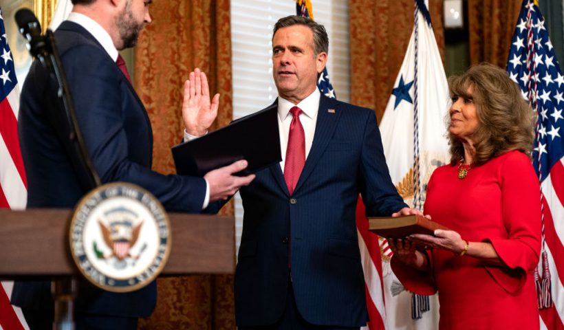WASHINGTON, DC - JANUARY 23: U.S. Vice President J.D. Vance swears in newly confirmed CIA Director John Ratcliffe while his wife, Michele Ratcliffe looks on during a ceremony in the Eisenhower Executive Office Building at the White House on January 23, 2025 in Washington, DC. Former Rep. John Ratcliffe (R-TX) served as Director of National Intelligence during President Trump's first term. (Photo by Kent Nishimura/Getty Images)